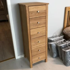 Saga byrå hög ek
