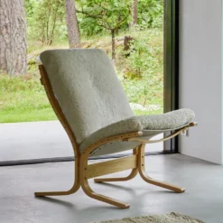 Siesta Ovis fåtölj låg – fårskinn moonlight
