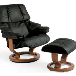 Stressless Reno fåtölj M & pall – läder paloma svart